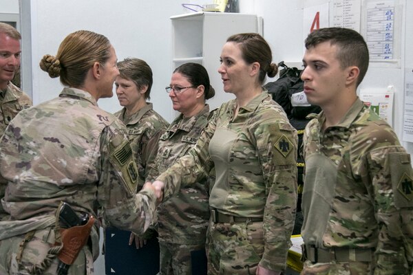 Col. Kimberly Colloton expresses her appreciation to the staff at the New Kabul Compound Medical Clinic for supporting all deployed personnel.