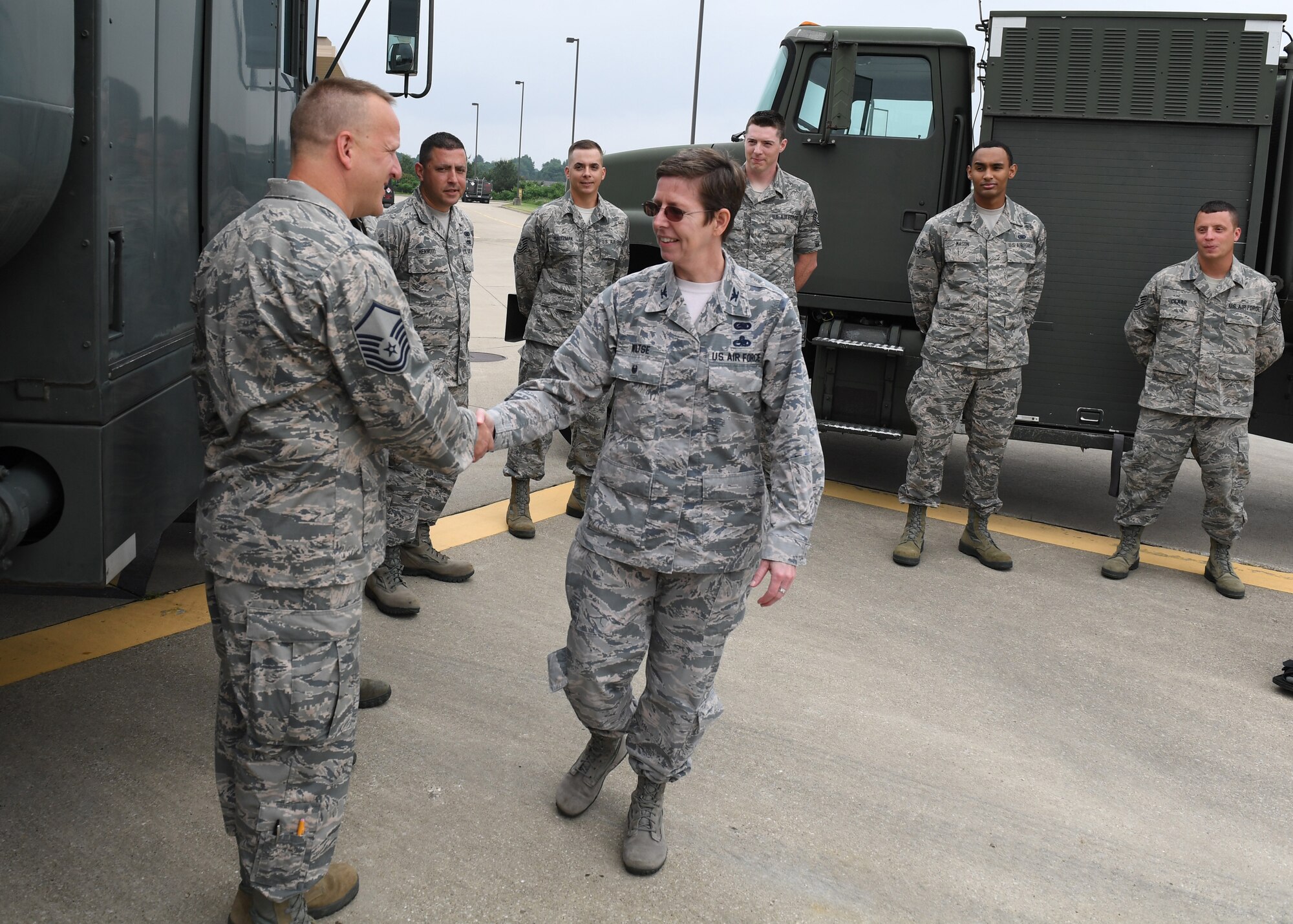 Col. Gretchen M. Wiltse greets members of the 911th Fuels Management Flight on June 1, 2018, at Pittsburgh International Airport Air Reserve Station, Pennsylvania. The flight won the Golden Derrick award for Best Fuels Management Flight in the Air Force Reserve Command for 2017. Wiltse is the chief of the AFRC Logistics Readiness Division. (U.S. Air Force Photo by Staff Sgt. Zachary Vucic)