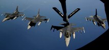 Four U.S. Air Force F-16CM Fighting Falcon pilots fly in formation above the Atlantic Ocean, June 19, 2018.