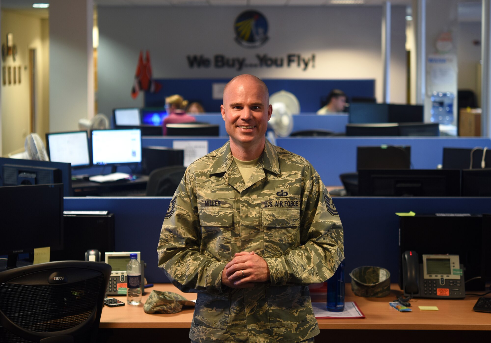 Tech. Sgt. David E. Miller, 48th Contracting Squadron Personnel and Readiness NCO in-charge, poses for a photo at the 48th CONS at Royal Air Force Lakenheath, England, June 25, 2018. Through his outstanding leadership abilities, job performance and personal achievements, Miller earned the illustrious Air Force’s Outstanding Airman of the Year award for 2018. (U.S. Air Force photo by Staff Sgt. Alex Fox Echols III)