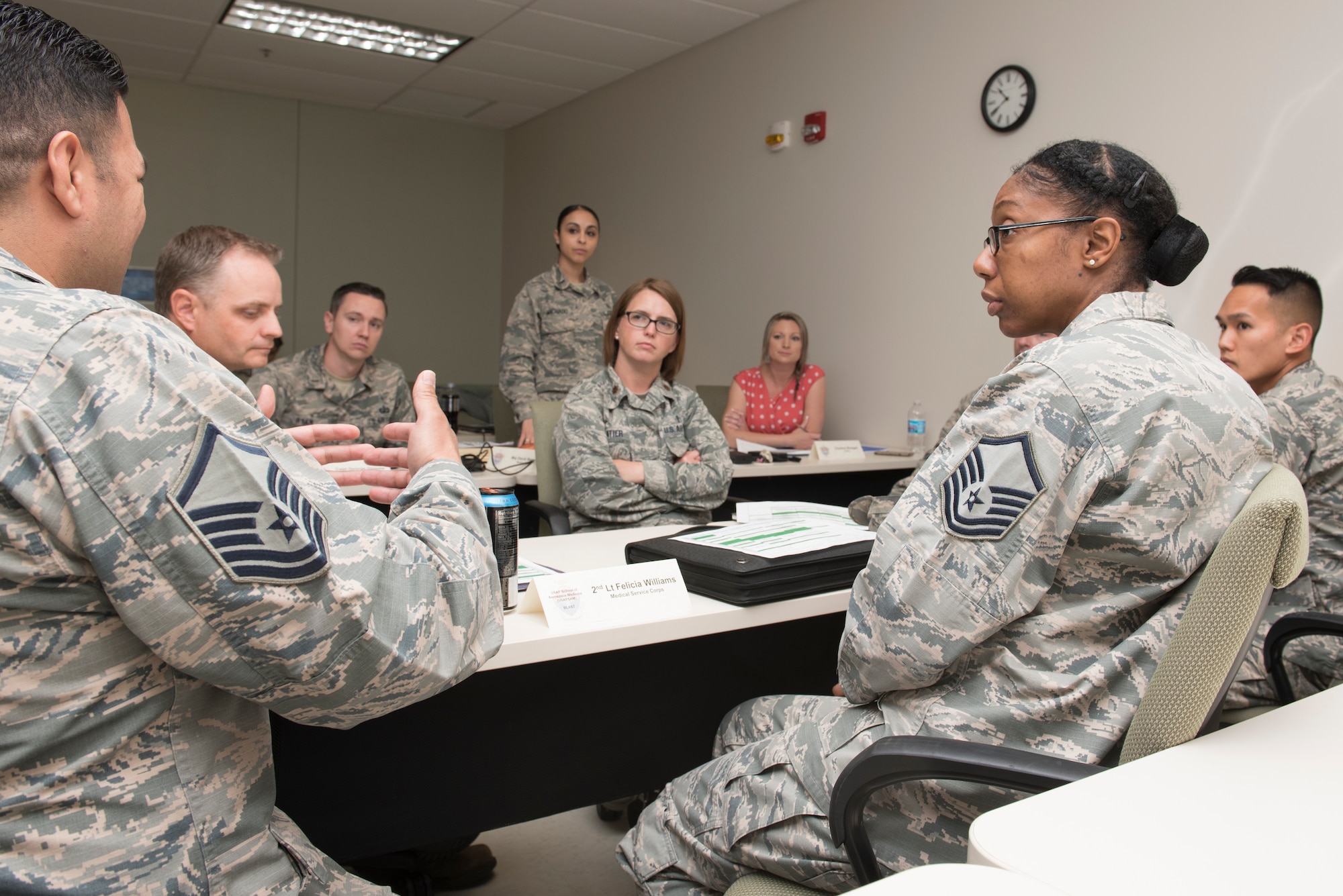 Students brainstorm capstone solutions for the Basic Leadership Airman Skills Training Course in a classroom at USAFSAM, Wright-Patterson Air Force Base, Ohio, May 25, 2018.