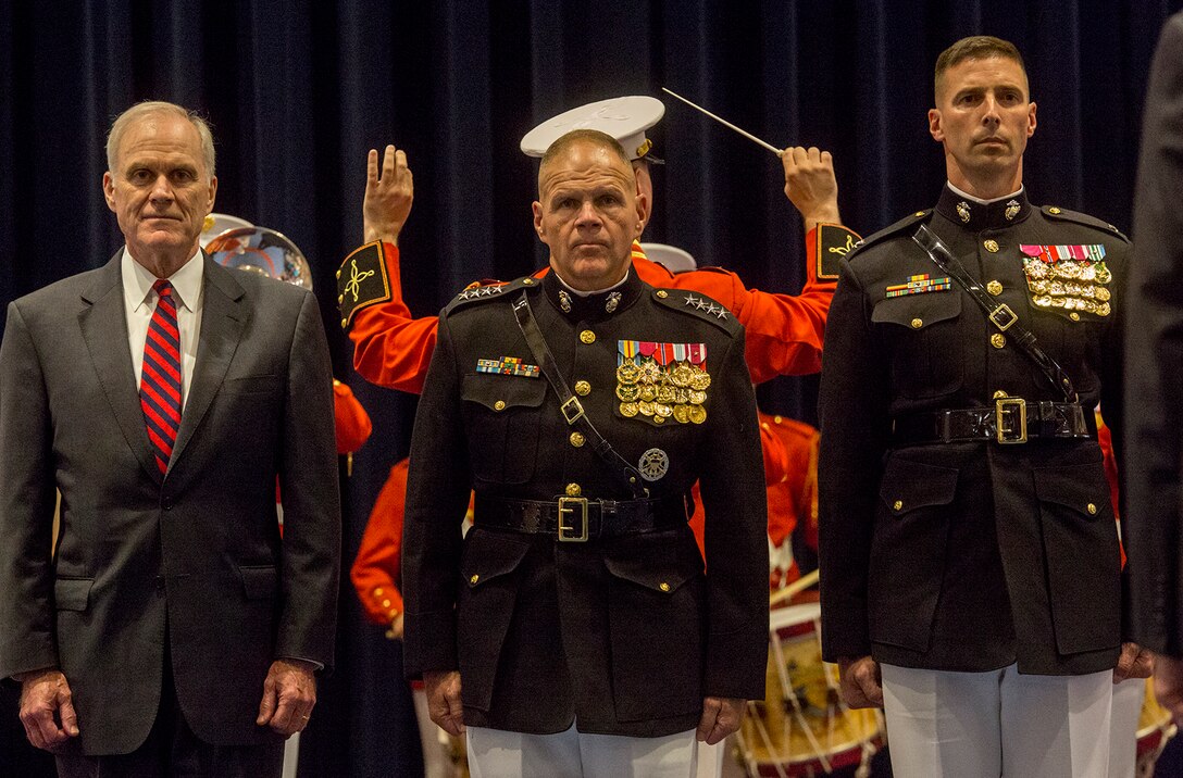 From left, Secretary of the Navy, Richard V. Spencer, Commandant of the Marine Corps, Gen. Robert B. Neller, and Col. Don Tomich, commanding officer, Marine Barracks Washington D.C., stand at attention for “honors” during a Friday Evening Indoor Ceremony at the Barracks June 22, 2018. The guest of honor for the ceremony was Secretary of the Navy, Richard V. Spencer, and the hosting official was the Commandant of the Marine Corps, Gen. Robert B. Neller. (Official Marine Corps photo by Sgt. Robert Knapp/Released)