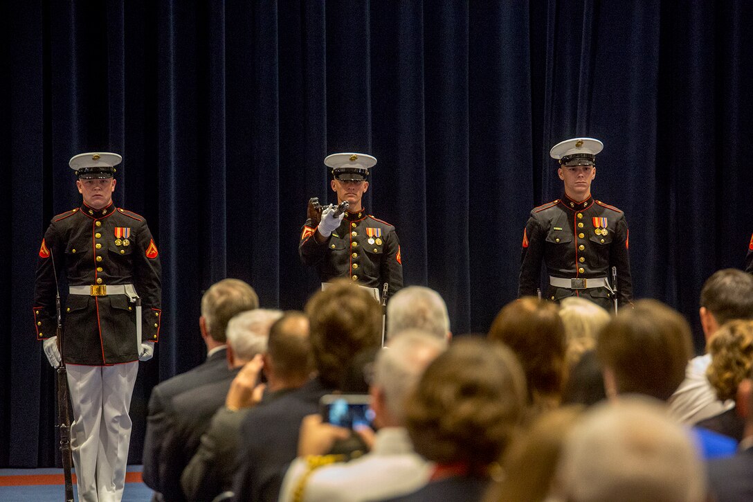 Marines with the U.S. Marine Corps Silent Drill Platoon execute their “long line” sequence during a Friday Evening Indoor Ceremony at Marine Barracks Washington D.C., June 22, 2018. The guest of honor for the ceremony was Secretary of the Navy, Richard V. Spencer, and the hosting official was the Commandant of the Marine Corps, Gen. Robert B. Neller. (Official Marine Corps photo by Sgt. Robert Knapp/Released)