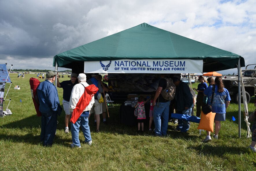 Air show fans visit the National Museum of the USAF booth at the Vectren Dayton Air Show on June 23, 2018.  (U.S. Air Force photo by Ken LaRock)