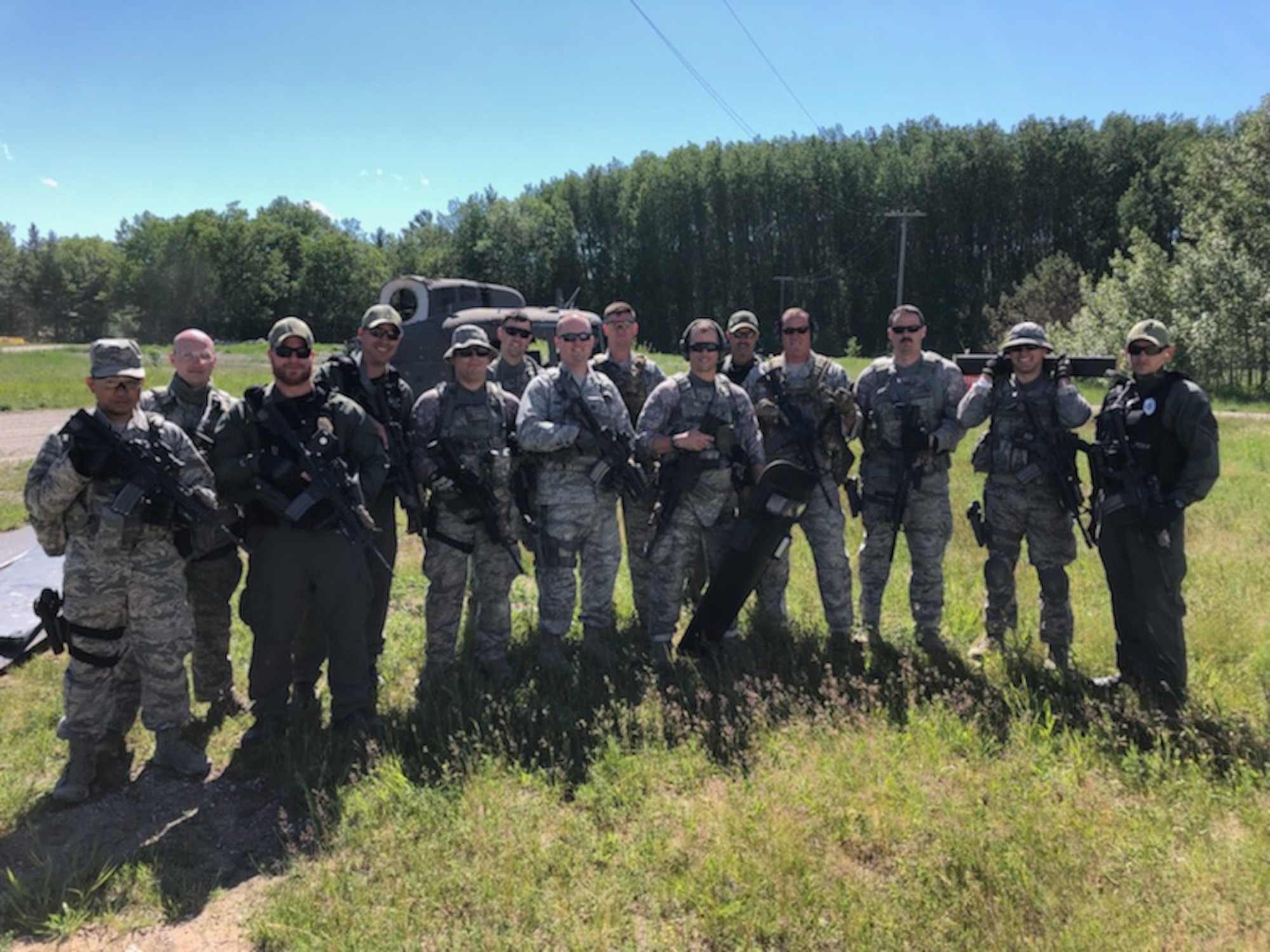 Five members of the Ohio Department of Rehabilitation and Correction’s Special Tactics and Response Team partner with 178th Wing Security Forces Squadron to conduct training at the Alpena Combat Readiness Training Center, Mich., June 11-15, 2018. STAR instructors trained Airmen in less-than lethal weapons tactics, riot control, active shooter response, building clearing and personnel tracking.