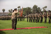 U.S. Marines with 7th Engineer Support Battalion, 1st Marine Logistics Group, conduct a pass and review during a change of command ceremony at Camp Pendleton, Calif., June 21, 2018. Lieutenant Colonel Jennifer Nash relinquished her duties to Lt. Col. Evan Day, who will now serve as the commanding officer for 7th ESB. (U.S. Marine Corps photo by Lance Cpl. Quentarius Johnson)