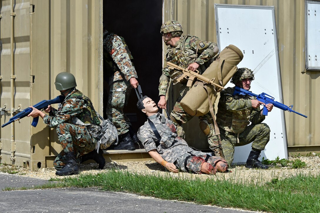 Soldiers from Macedonia, the U.S. and Kosovo evacuate a simulated casualty.