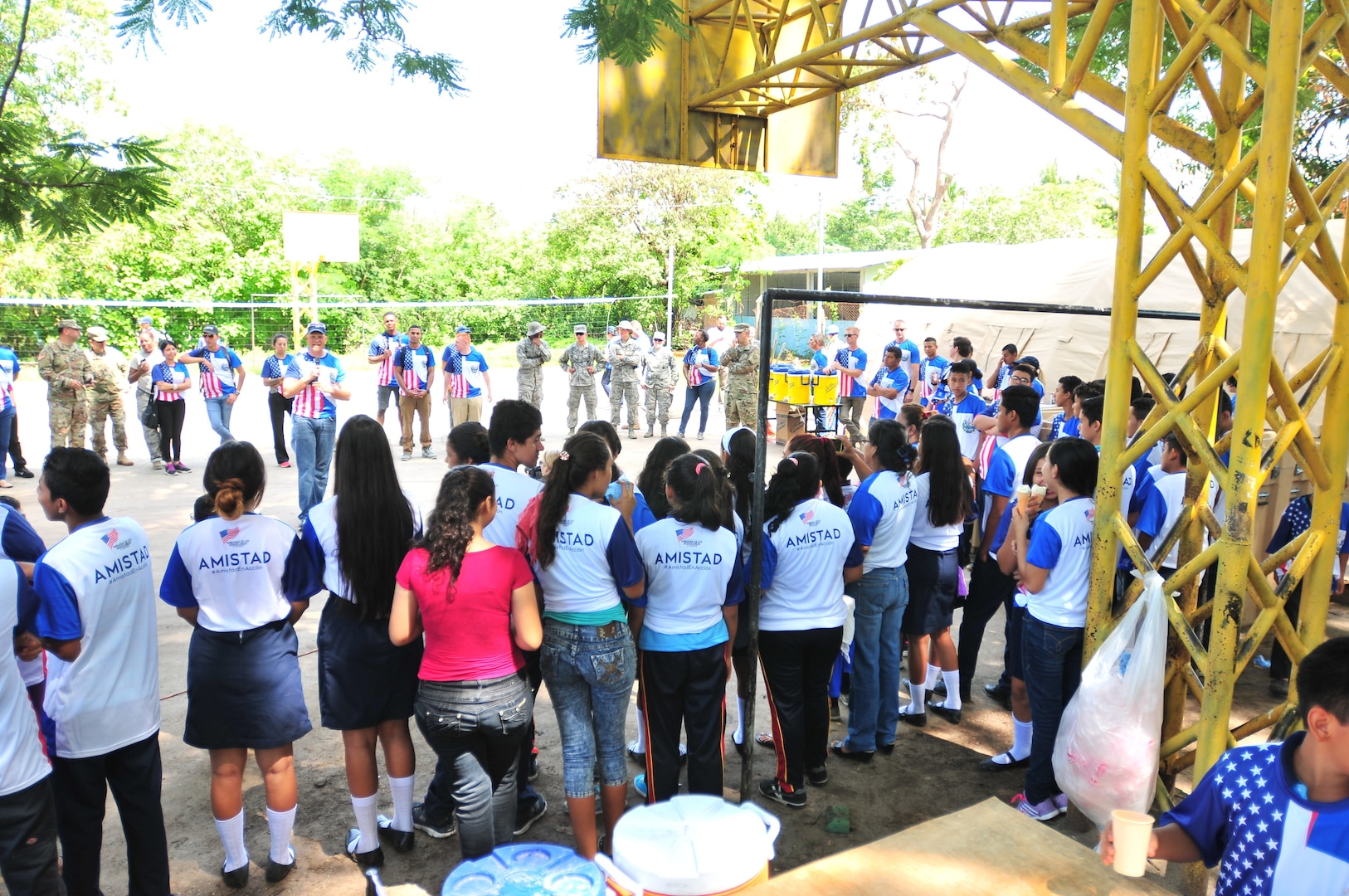 Tobias Bradford, the public affairs counselor for the U.S. Embassy, El Salvador, addresses the crowd of volunteers, students, and U. S. service members before the start of Friendship Day at a Beyond the Horizon 2018 school construction site in the area of Zacatecoluca, El Salvador, June 15, the day that is officially recognized by both governments as the day of U.S. and Salvadoran friendship.