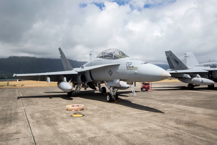 A F/A-18 Hornet aircraft assigned to Marine All-Weather Fighter Attack Squadron 533 sits at Hangar 105, Marine Corps Air Station Kaneohe Bay, Marine Corps Base Hawaii, June 22, 2018. The squadron is currently aboard MCBH to support Exercise Rim of the Pacific 2018. (U.S. Marine Corps photo by Lance Cpl. Isabelo Tabanguil)