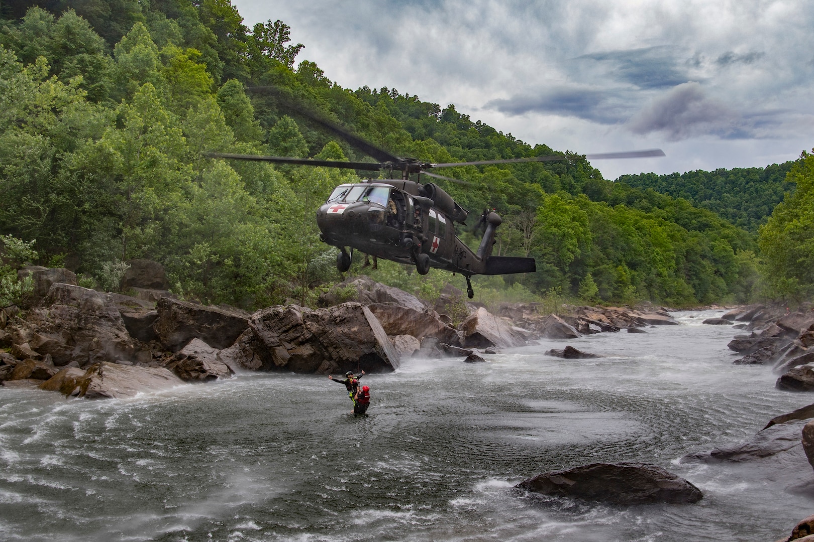 West Virginia National Guard Soldiers with Company C 2/104th General Support Aviation Battalion (Medevac) fly the West Virginia Swift Water Rescue Team as they complete Federal Emergency Management Agency (FEMA) Level 1 training June 11, 2018, at Camp Dawson, W.Va. The WVSWRT was developed after the devastating floods of 2016 that impacted all 55 counties of the state of West Virginia to assist citizens in a time of need.