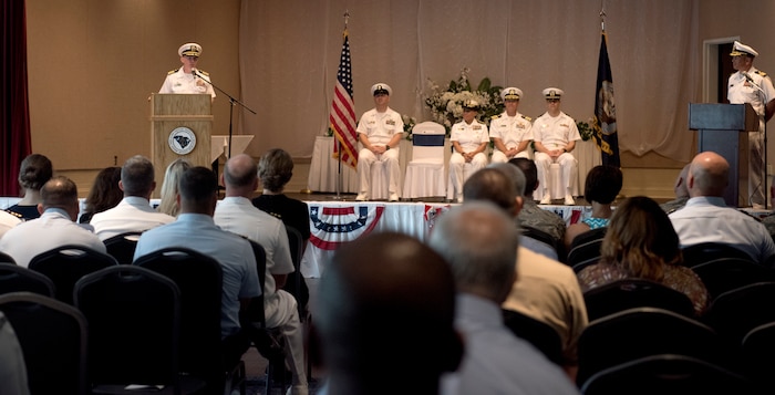 U.S. Navy Capt. Robert Hudson, outgoing deputy commander of Joint Base Charleston and commanding officer of Naval Support Activity Charleston, gives his remarks during a change of command ceremony June 25, 2018, at the Red Bank Club, Joint Base Charleston’s Naval Weapons Station.