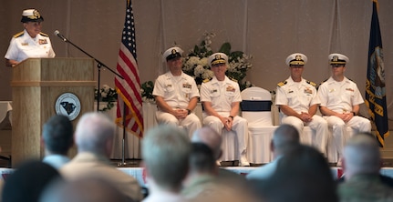 U.S. Navy Rear Adm. Babette Bolivar, Navy Region Southeast commander, delivers remarks during a change of command ceremony June 25, 2018, at the Red Bank Club, Joint Base Charleston’s Naval Weapons Station.