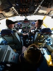 U.S. Air Force KC-135R Stratotanker pilots assigned to the 72nd Air Refueling Squadron, top, and a 77th Fighter Squadron F-16 Fighting Falcon pilot’s spouse prepare for an incentive flight at Shaw Air Force Base, S.C., June 20, 2018.