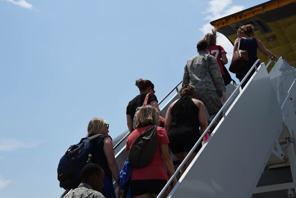 U.S. Airmen assigned to the 20th Fighter Wing (FW) and Team Shaw spouses board a 72nd Air Refueling Squadron KC-135R Stratotanker prior to an incentive flight at Shaw Air Force Base, S.C., June 20, 2018.