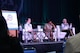 Panel members speak at the 2018 Joint Women's Leadership Symposium June 21, 2018, in San Diego, Calif. This year’s theme “The Power Within You” featured practical workshops, joint discussion boards, an international speakers panel and service specific breakout sessions intended to promote personal and professional development. (U.S. Air Force photo by 1st Lt. Annabel Monroe)