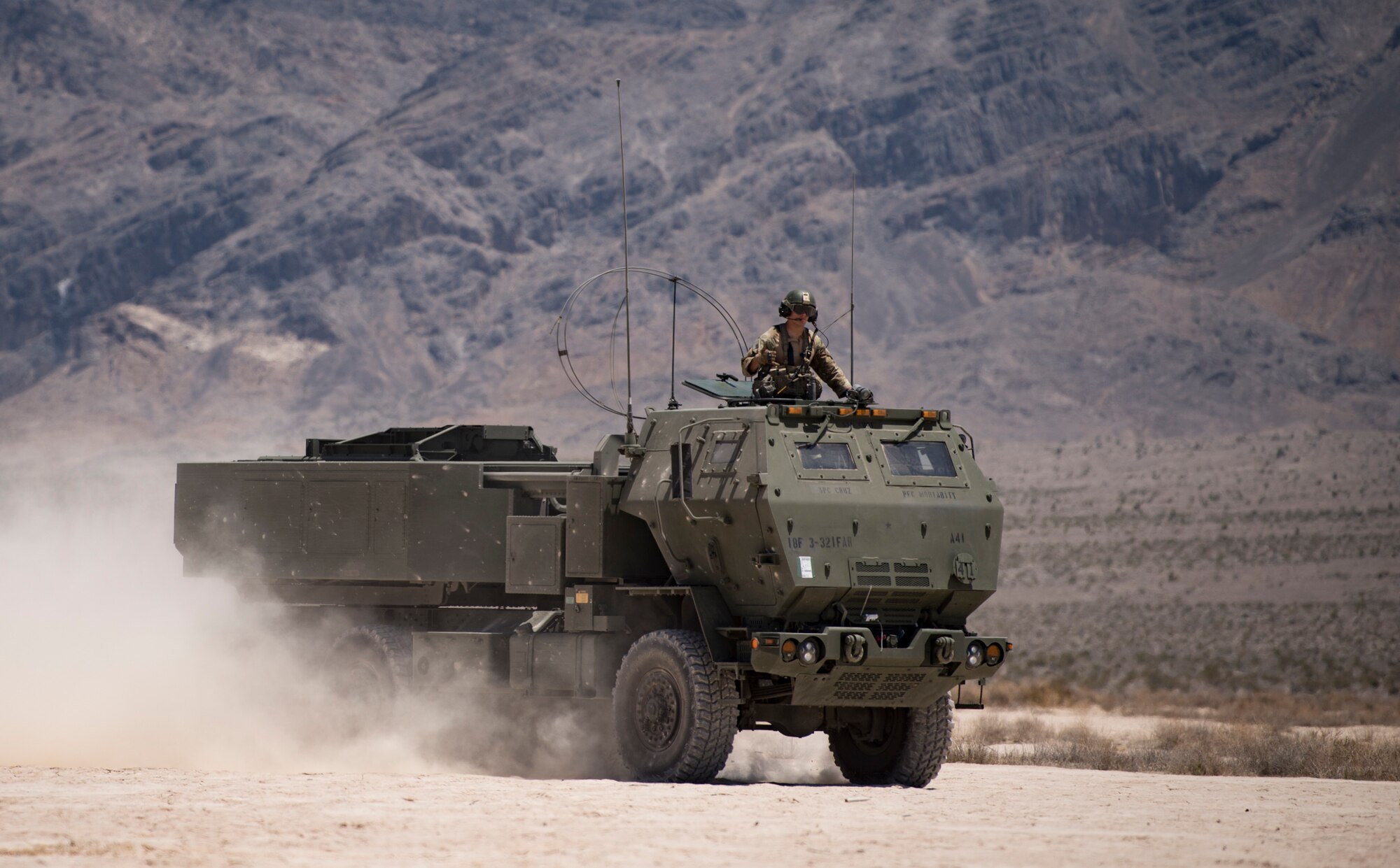 An M142 High Mobility Artillery Rocket System (HIMARS) assigned to 3rd Battalion, 321st Field Artillery Regiment, Fort Bragg, North Carolina, travels on the Nevada Test and Training Range June 9, 2018. The HIMARS is typically operated by a crew made up of a driver, gunner, and launcher chief. (U.S. Air Force photo by Airman 1st Class Andrew D. Sarver)