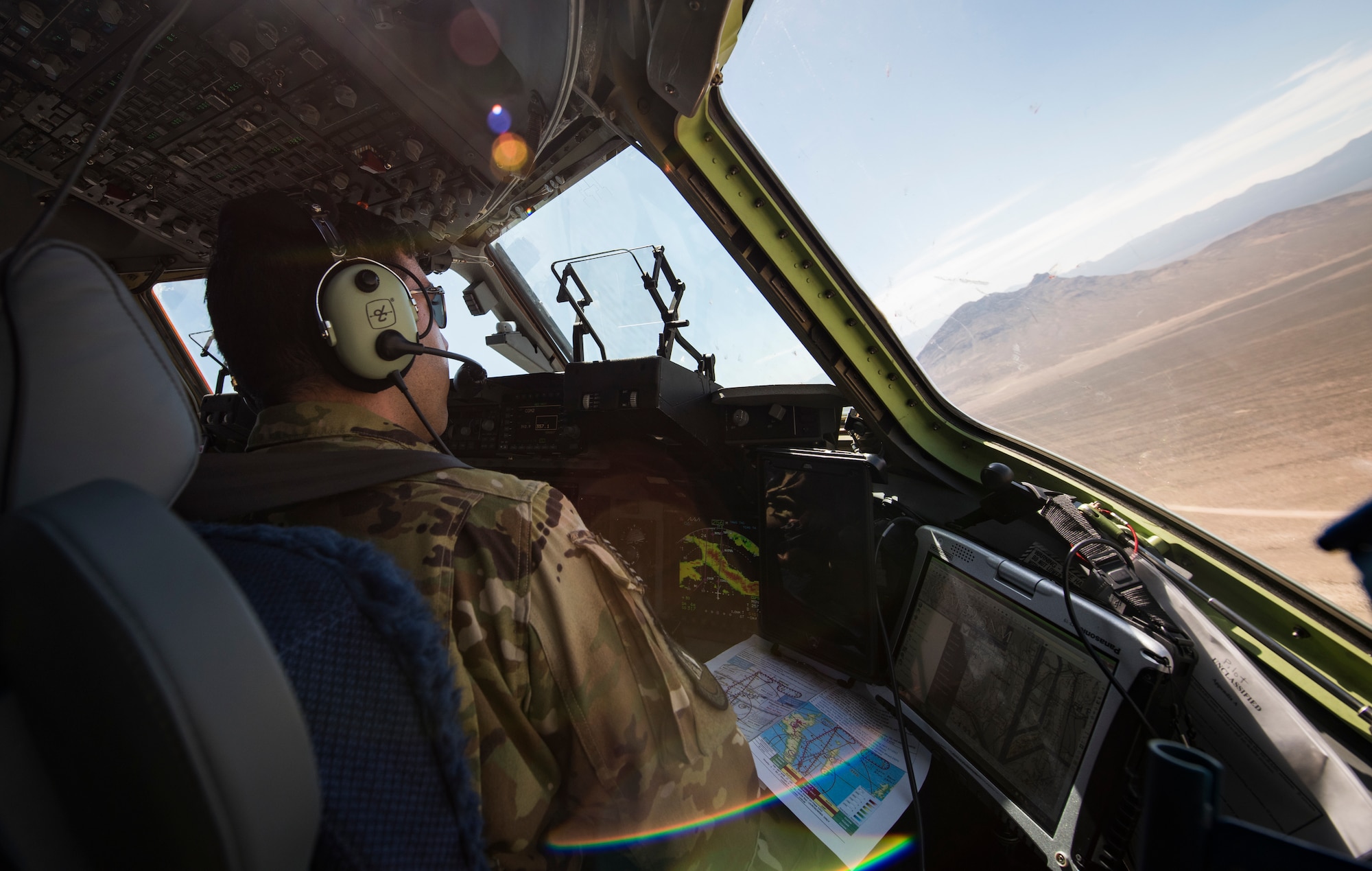 Capt. Ali Chinisaz, 6th Airlift Squadron instructor pilot, maneuvers a C-17 Globemaster III cargo aircraft towards a runway on the Nevada Test and Training Range, June 9, 2018. The crew took part in a joint forcible training exercise. (U.S. Air Force photo by Airman 1st Class Andrew D. Sarver)