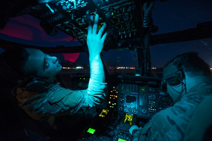 Tech Sgt. Jeremy Sutter, a special missions aviator assigned to the 34th Weapons Squadron, runs avionics checks on an HH-60G Pave Hawk helicopter June 11, 2018 at Nellis Air Force Base, Nev. The crew was preparing for a U.S. Air Force Weapons School training scenario which tasked them with locating, recovering and providing initial medical treatments for a downed pilot. (U.S. Air Force photo by Staff Sgt. Joshua Kleinholz)