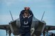 Staff Sgt. Zachary Madera, F-35 Heritage Flight Team crew chief, marshals an F-35A Lightning II at the Quonset State Airport in North Kingstown, R.I., June 7, 2018. Throughout the air show season, the F-35 HFT will perform at 13 air shows around the world. (U.S. Air Force photo by Airman 1st Class Alexander Cook)