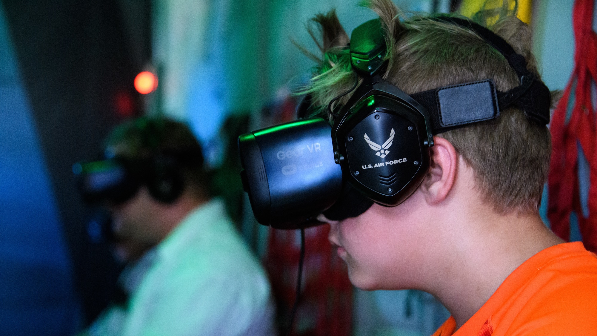 Darrin Moore experiences a high-altitude, low-opening jump in virtual reality during the Warriors Over the Wasatch Air and Space Show June 23, 2018, at Hill Air Force Base, Utah. Recuiters assigned to the 368th Recruiting Squadron brought 'The Air Force Special Ops Air Commando Experience' venue to the air show and were on hand to answer questions about Air Force careers. (U.S. Air Force photo by R. Nial Bradshaw)