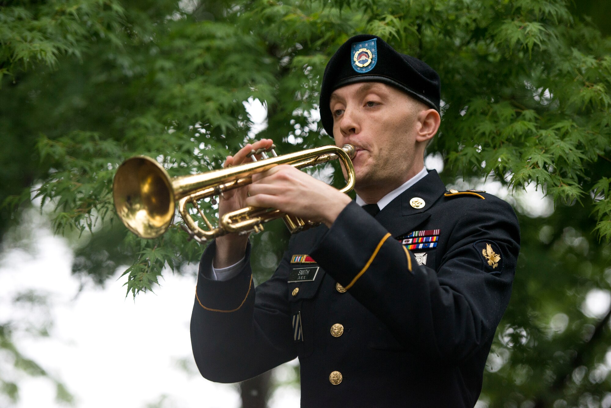 U.S. Army Specialist Thomas Smith, U.S. Army Japan Band member, plays 'Taps'
