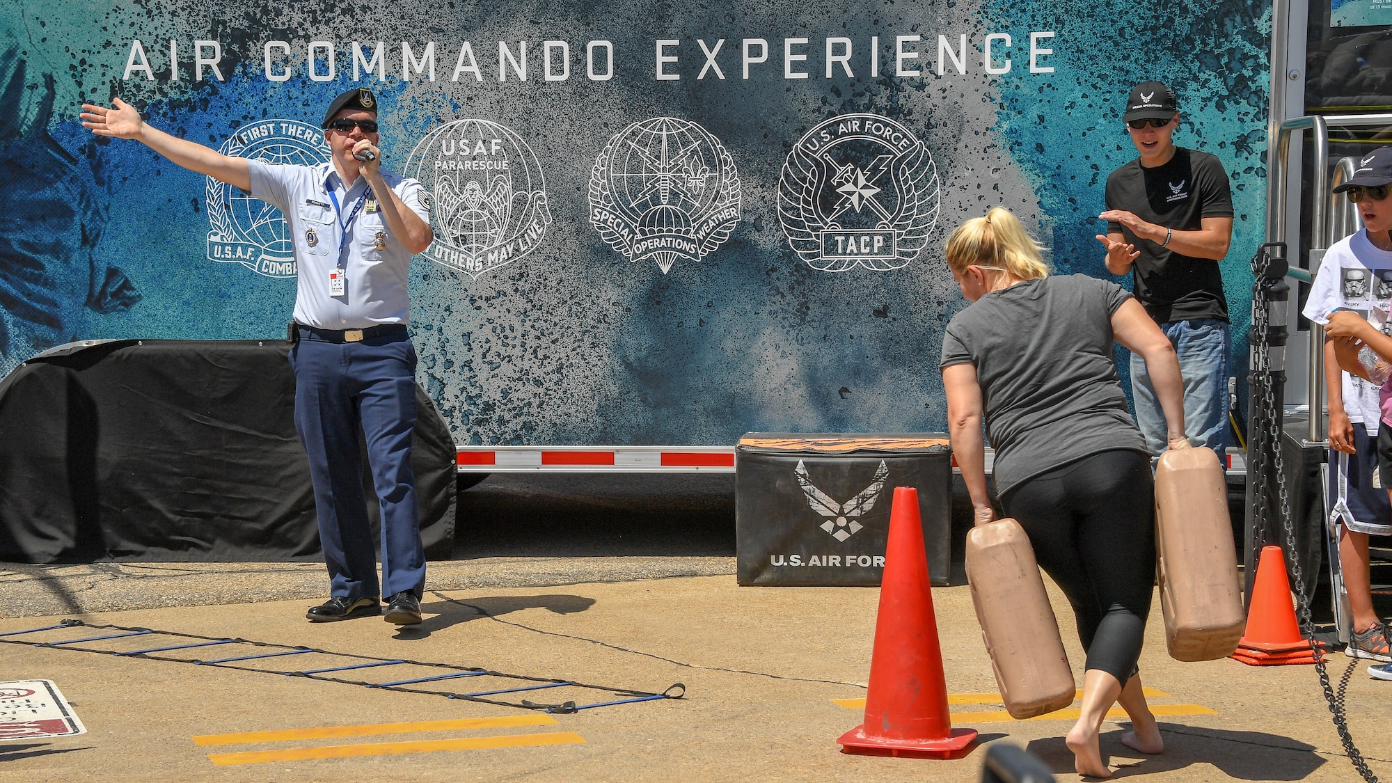 An air show visitor competes in the Air Commando Special Ops skills challenge during the Warriors Over the Wasatch Air and Space Show June 23, 2018, at Hill Air Force Base, Utah. 'The Air Force Special Ops Air Commando Experience' was brought to the air show by the 368th Recruiting Squadron. (U.S. Air Force photo by R. Nial Bradshaw)