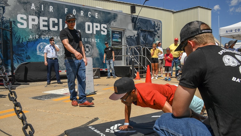 An air show visitor competes in the Air Commando Special Ops skills challenge during the Warriors Over the Wasatch Air and Space Show June 23, 2018, at Hill Air Force Base, Utah. 'The Air Force Special Ops Air Commando Experience' was brought to the air show by the 368th Recruiting Squadron. (U.S. Air Force photo by R. Nial Bradshaw)