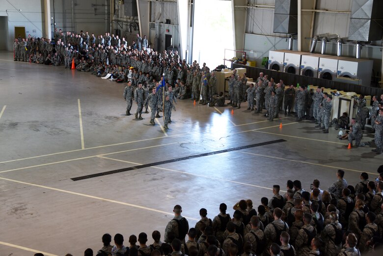 The 315th Training Squadron drill team marches during the regulation portion of the 17th Training Group drill competition at the Louis F. Garland Department of Defense Fire Academy on Goodfellow Air Force Base, Texas, June 22, 2018. The 315th TRS won first place in this section of the drill competition. (U.S. Air Force photo by Staff Sgt. Joshua Edwards/Released)