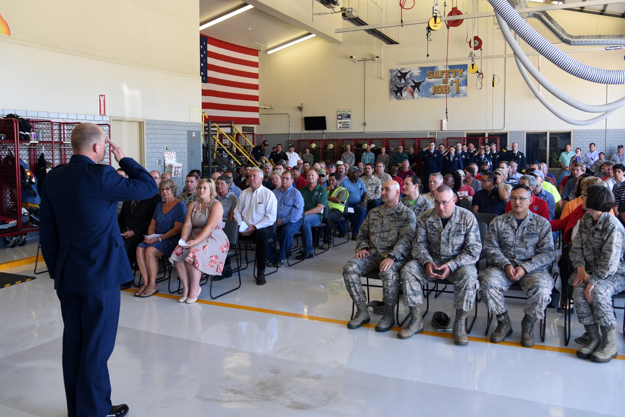 U.S. Air Force Maj. Nicholas Anderson, 17th Civil Engineer Squadron commander, salutes his squadron for the first time during the 17th CES Assumption of Command at the fire department on Goodfellow Air Force Base, Texas, June 22, 2018. The assumption of command ceremony provides an opportunity for members of the unit to see their new commander, and for the new commander to inspect his or her troops. (U.S. Air Force photo by Staff Sgt. Joshua Edwards/Released)