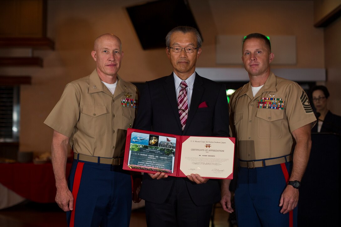 Japanese employees retire from air station with 488 combined years of service