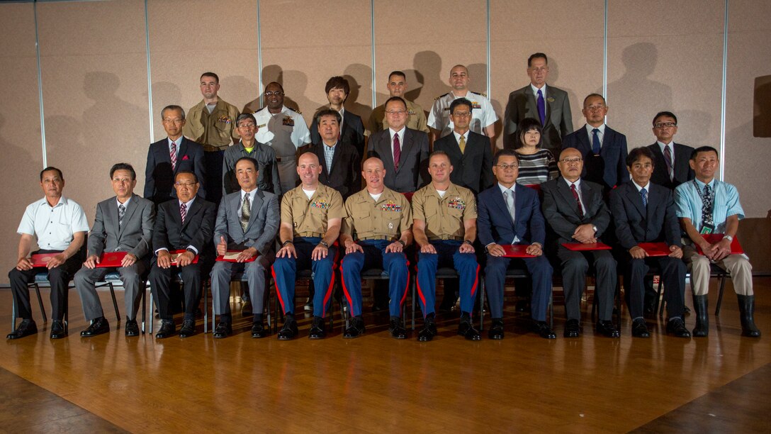 Japanese employees retire from air station with 488 combined years of service
