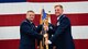 Col. Max Pearson, 480th Intelligence, Surveillance and Reconnaissance Wing commander, left, presents the guidon to Col. Les Oberg, incoming 607th Air Operations Center Chief of the Intelligence, Surveillance, and Reconnaissance Division during a change of command ceremony at Osan Air Base, Republic of Korea, June 26, 2018.