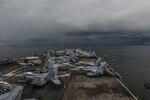 PHILIPPINE SEA (June 26, 2018) The Navy's forward-deployed aircraft carrier, USS Ronald Reagan (CVN 76), steams along the coast of the Republic of the Philippines before a scheduled port visit in Manila. Ronald Reagan, the flagship of Carrier Strike Group 5, provides a combat-ready force that protects and defends the collective maritime interests of its allies and partners in the Indo-Pacific region.