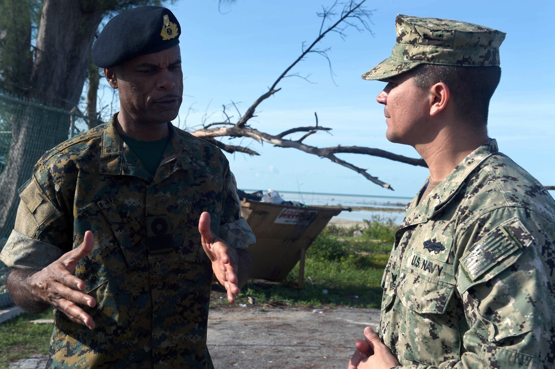 Military troops talk.