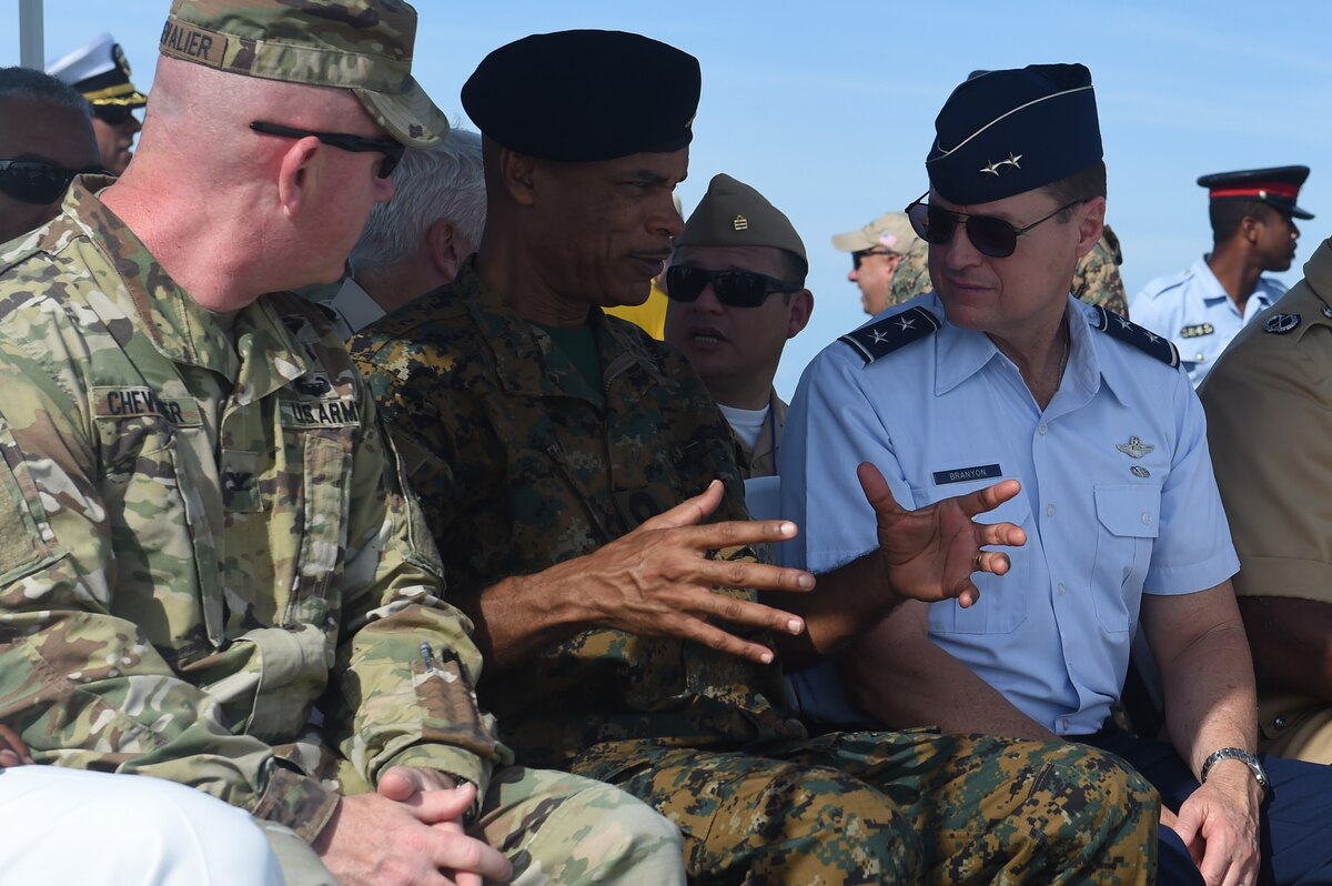 Military members talk.