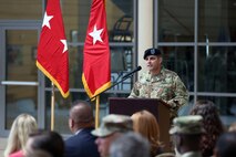 Soldier speaking at podium