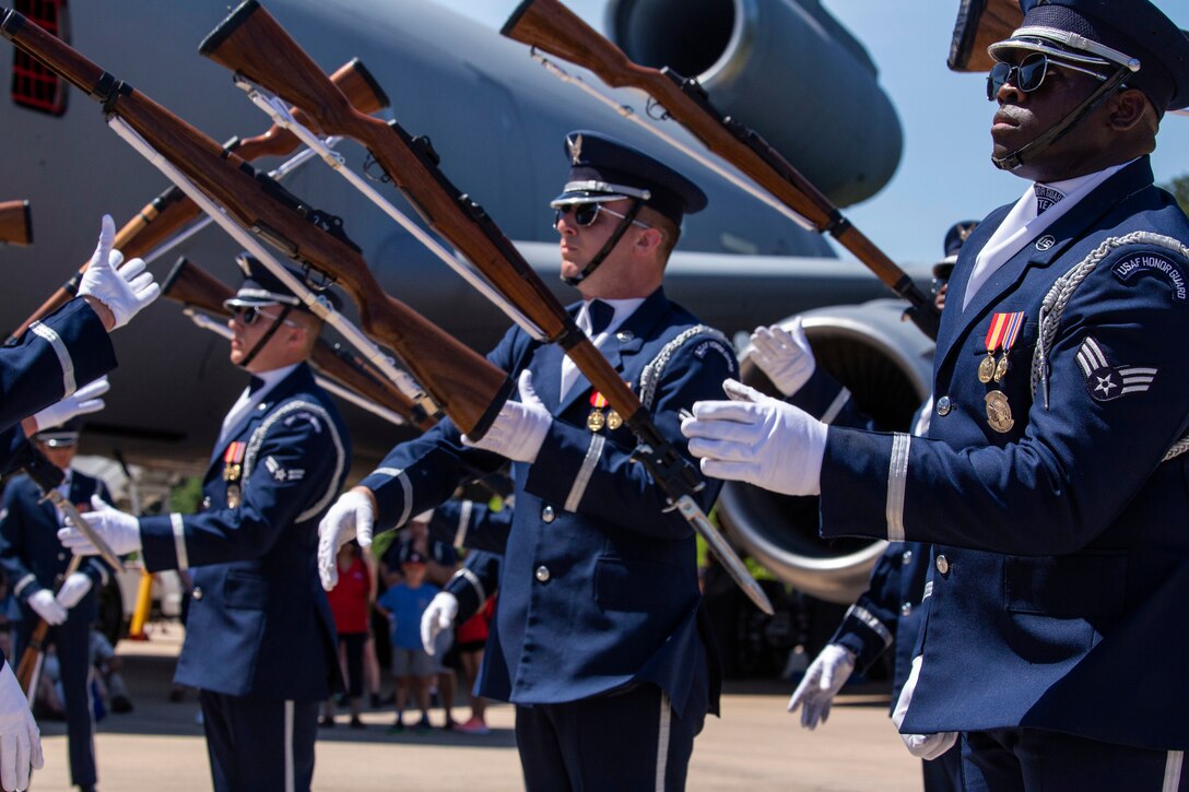 Air Force Honor Guard Drill Team exhibits precision and coordination.
