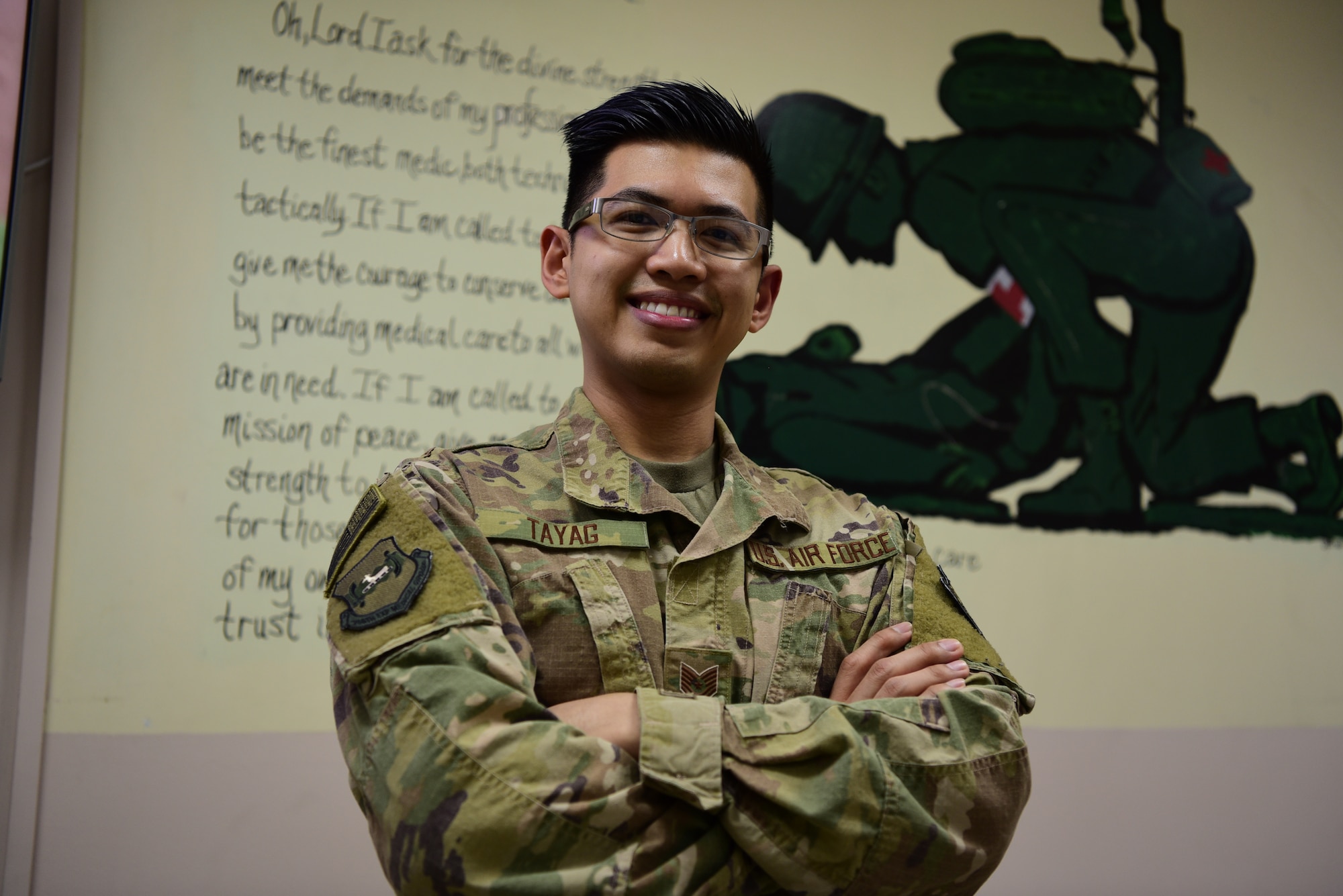 Tech. Sgt. Julian Tayag, 386 EMDG pharmacy non-commissioned officer-in-charge, poses for a photo June 22, 2018, at an undisclosed location in Southwest Asia. In early May 2018, Tayag was selected for the Interservice Physician Assistant Program. The program, which was created as a joint effort in 1996 by the U.S. Air Force, U.S. Army and U.S. Navy, serves as a bridge for service members to attend school to become physician assistants. (U.S. Air Force photo by Staff Sgt. Christopher Stoltz)