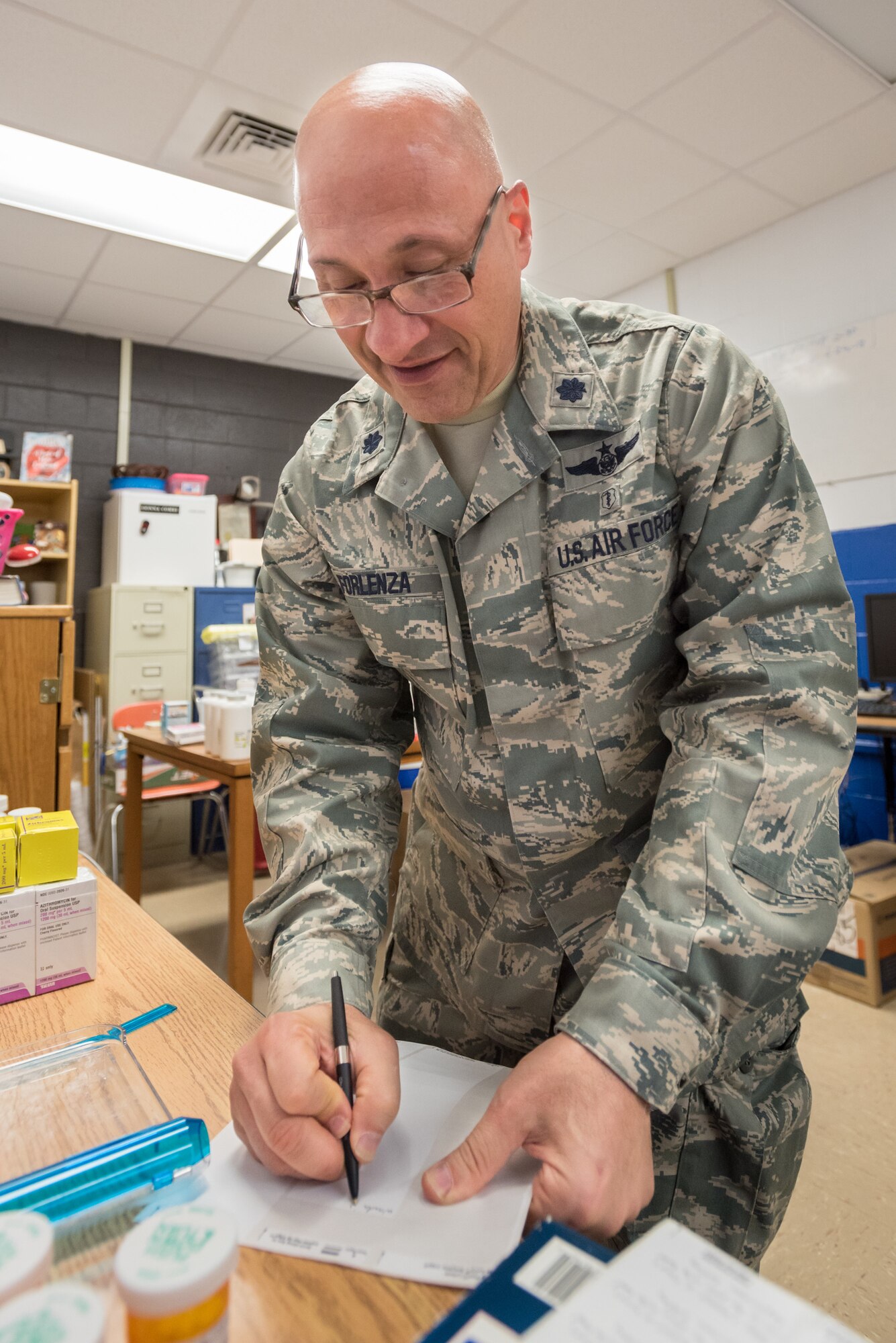 U.S. Air Force Lt. Col. Philip Forlenza, a pharmacist from the New York Air National Guard’s 105th Airlift Wing, fills a patient prescription at a health-care clinic being operated by the Air Guard and U.S. Navy Reserve at Breathitt County High School in Jackson, Ky., June 20, 2018. The Jackson clinic is one of four that comprised Operation Bobcat, a 10-day mission to provide military medical troops with crucial training in field operations and logistics while offering no-cost health care to the residents of Eastern Kentucky. The clinics, which operated from June 15-24, offered non-emergent medical care; sports physicals; dental cleanings, fillings and extractions; eye exams and no-cost prescription eye glasses. (U.S. Air National Guard photo by Lt. Col. Dale Greer)