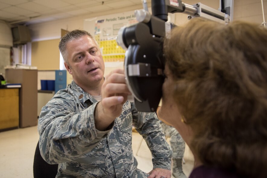 U.S. Air Force Maj. Brett Ringger, an optometrist from the Texas Air National Guard’s 136th Airlift Wing, tests a patient’s vision at a health-care clinic being operated by the Air National Guard and U.S. Navy Reserve at Lee County High School in Beattyville, Ky., June 23, 2018. The clinic is one of four that comprised Operation Bobcat, a 10-day mission to provide military medical troops with crucial training in field operations and logistics while offering no-cost health care to the residents of Eastern Kentucky. The clinics, which operated from June 15-24, offered non-emergent medical care; sports physicals; dental cleanings, fillings and extractions; eye exams and no-cost prescription eye glasses. (U.S. Air National Guard photo by Lt. Col. Dale Greer)