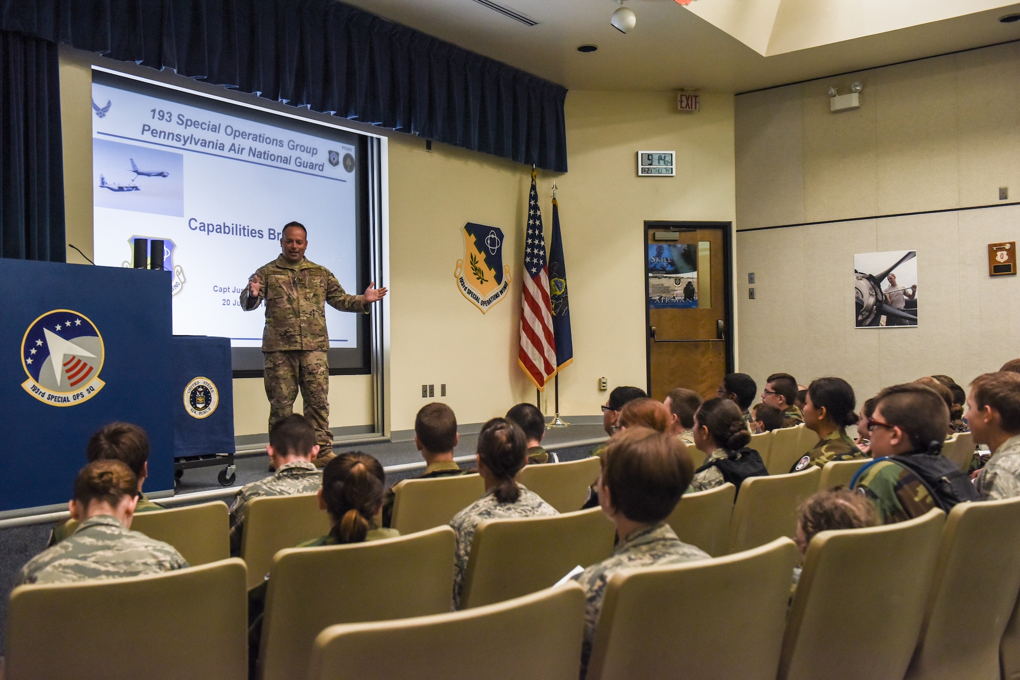 U.S. Air Force Capt. Justin Livick briefs the capabilities and mission of the 193rd Special Operations Wing to a group of Civil Air Patrol cadets.