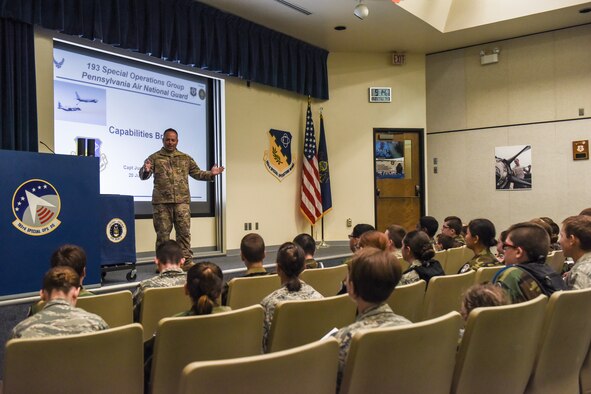 U.S. Air Force Capt. Justin Livick briefs the capabilities and mission of the 193rd Special Operations Wing to a group of Civil Air Patrol cadets.