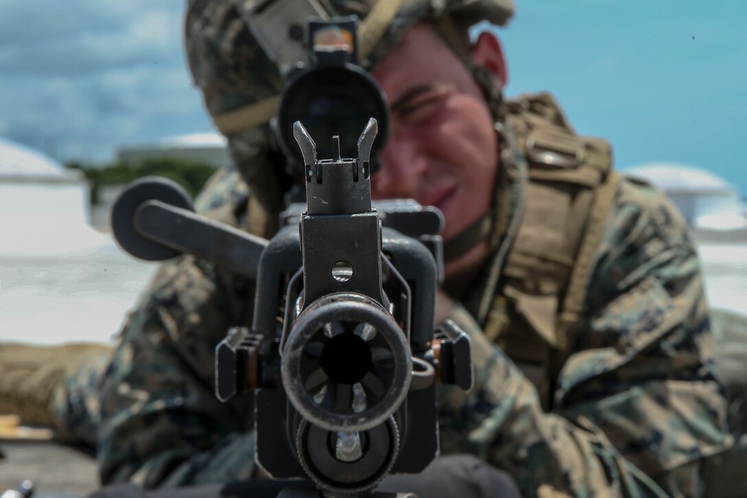 Cpl. Benjamin A. Allen, a field artillery fire control Marine with Fox Battery, Battalion Landing Team, 2nd Battalion, 5th Marines, and a native of Norwood, Massachusetts provides security during embassy reinforcement training as part of the 31st Marine Expeditionary Unit’s MEU Exercise at Camp Hansen, Okinawa, Japan, June 21, 2018. MEUEX is the first in a series of pre-deployment training events that prepare the 31st Marine Expeditionary Unit to deploy at a moment’s notice. The 31st MEU, the Marine Corps' only continuously forward-deployed MEU, provides a flexible force ready to perform a wide-range of military operations.