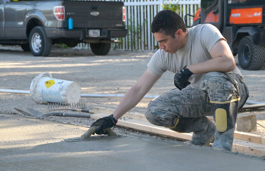 375th Civil Engineer Squadron pours concrete for bare base exercise area.