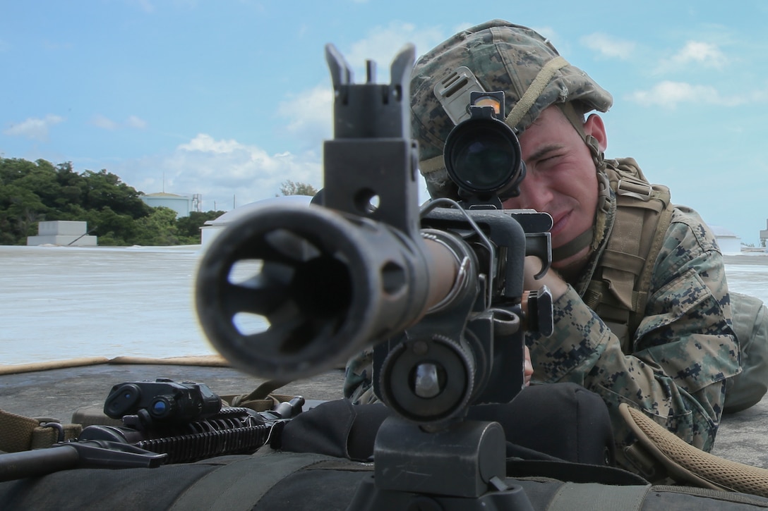 Cpl. Benjamin A. Allen, a field artillery fire control marine with Fox Battery, Battalion Landing Team, 2nd Battalion, 5th Marines, and a native of Norwood, Massachusetts provides security during embassy reinforcement training as part of the 31st Marine Expeditionary Unit’s MEU Exercise at Camp Hansen, Okinawa, Japan, June 21, 2018. MEUEX is the first in a series of pre-deployment training events that prepare the 31st Marine Expeditionary Unit to deploy at a moment’s notice. The 31st MEU, the Marine Corps' only continuously forward-deployed MEU, provides a flexible force ready to perform a wide-range of military operations.