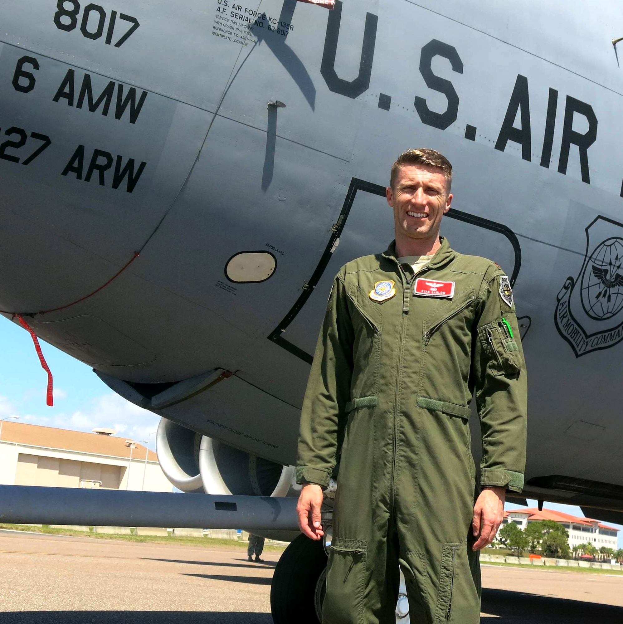 U.S Air Force Maj. Ryan Garlow, 6th Aircraft Maintenance Squadron commander, poses in front of a KC-135 Stratotanker aircraft before Tampa Bay AirFest 2016 at MacDill Air Force Base, Fla. March 18, 2016.