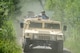 Airmen from the 23d Civil Engineer Squadron (CES) ride in Humvees during tactical convoy operations training, June 21, 2018, at Moody Air Force Base, Ga. For the first time at Moody, 820th Base Defense Group personnel equipped 23d CES Airmen with convoy operations skills to efficiently perform mine-resistant, ambush-protected vehicle roll-over simulator evacuations. (U.S. Air Force photo by Airman 1st Class Eugene Oliver)