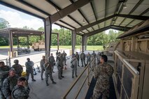 Staff Sgt. Ulysses Ortiz, right, 820th Combat Operations Squadron unit trainer, instructs procedures to Airmen from the 23d Civil Engineer Squadron (CES) during tactical convoy operations training, June 21, 2018, at Moody Air Force Base, Ga. For the first time at Moody, 820th Base Defense Group personnel equipped 23d CES Airmen with convoy operations skills to efficiently perform mine-resistant, ambush-protected vehicle roll-over simulator evacuations. (U.S. Air Force photo by Airman 1st Class Eugene Oliver)