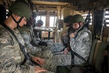 Airmen from the 23d Civil Engineer Squadron (CES) sit inside of a mine-resistant, ambush-protected vehicle roll-over simulator (MRAP) during tactical convoy operations training, June 21, 2018, at Moody Air Force Base, Ga. For the first time at Moody, 820th Base Defense Group personnel equipped 23d CES Airmen with convoy operations skills to efficiently perform MRAP evacuations. (U.S. Air Force photo by Airman 1st Class Eugene Oliver)