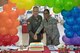 Col. Michael Miller, 2nd Bomb Wing commander, and Airman 1st Class Wenona Welch, 2nd Logistics Readiness Squadron, cut a cake during Barksdale's LGBT Pride Month observance event, June 22, 2018. (U.S. Air Force photo by Tech. Sgt. Daniel Martinez)